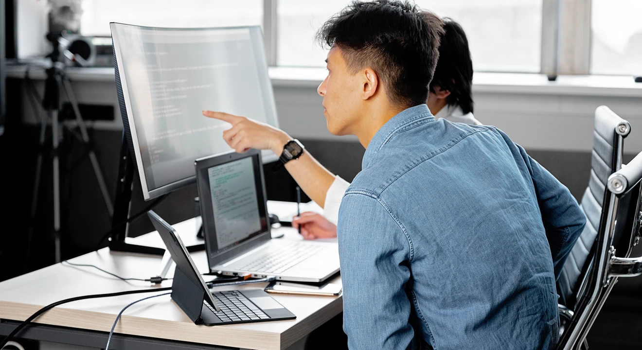 two Google L5 software engineers working together